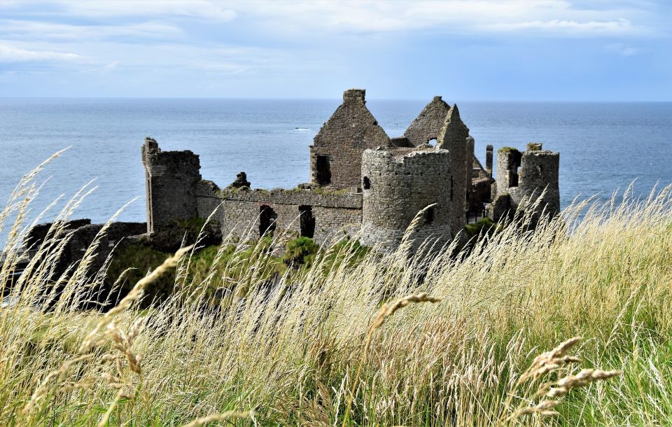 Belfast & Giant's Causeway: 2-Day Rail Tour from Dublin - Dunluce Castle and the return to Belfast