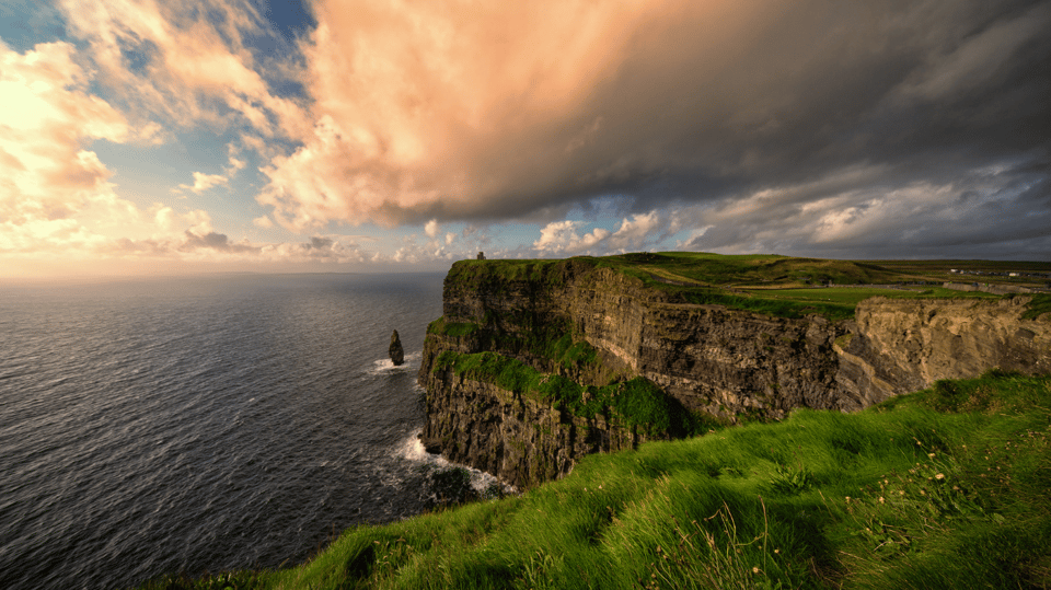Dublin: Cliffs of Moher, Ennis, & Bunratty Castle Day Tour - The guides can make the long road enjoyable