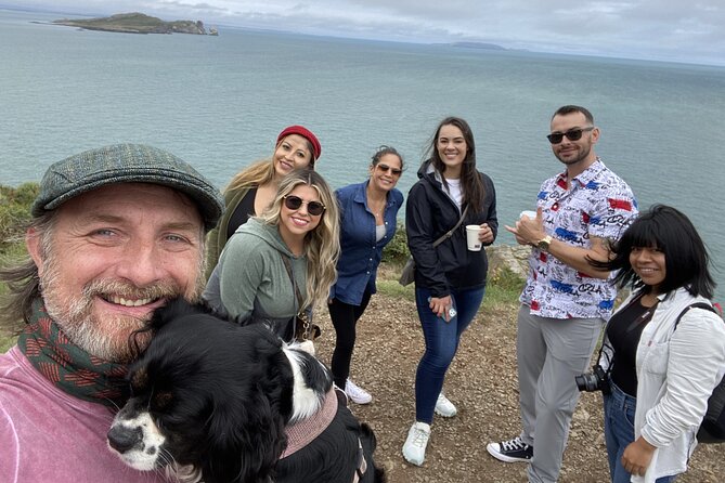 Dublin Coastal Hike and Pints with A local & His Dog Private tour - Howth Lighthouse and the harbor edge
