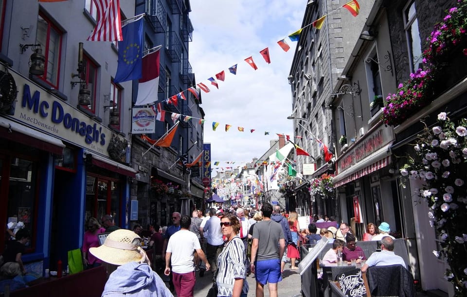 From Dublin: Galway + Cliffs of Moher Boat Cruise in Spanish - Seeing the Cliffs of Moher from below