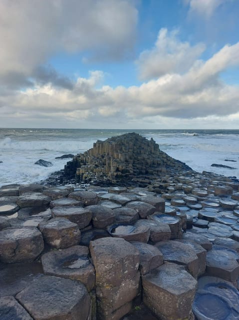 From Dublin: Giants Causeway Private Tour - Dunluce Castle from the coastal road