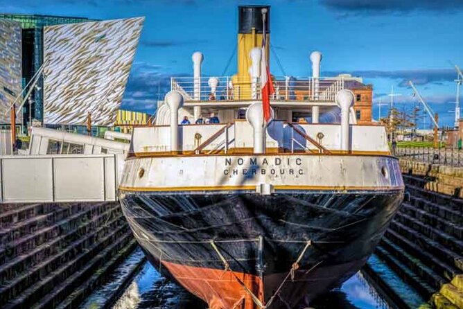 Titanic Exhibit Belfast City Private Chauffeur Tour from Dublin - The Peace Wall in a short, serious stop